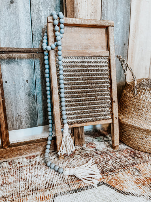 Farmhouse gray wood beaded garland with tassels
