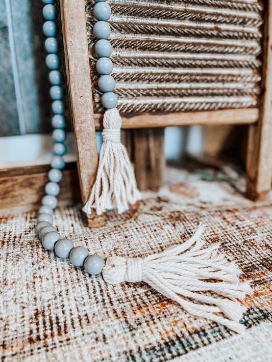 Farmhouse gray wood beaded garland with tassels